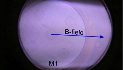 RF plasma sputtering in an ITER-relevant first mirror unit